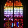 Stained glass windows with names of the crew